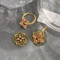 Wear multiple pairs of Chinese-style earrings.