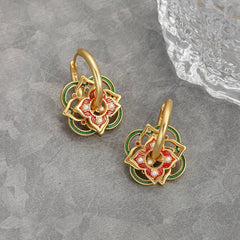 Wear multiple pairs of Chinese-style earrings.