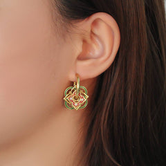 Wear multiple pairs of Chinese-style earrings.